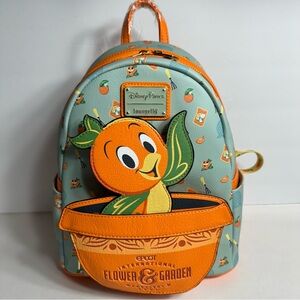 NWT. Disney Loungefly featuring Orange Bird. Approx. 10" H x 9 1/2" W x 5" D